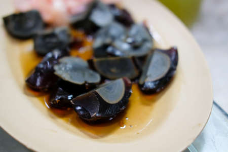 Preserved eggs are preserved in a special process giving the eggs a distinct look and tasteの写真素材