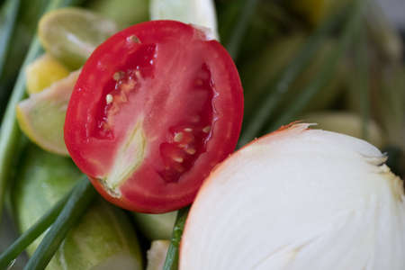 A sliced ripe tomatoà¸¡  ingredients for Thai cookingの写真素材