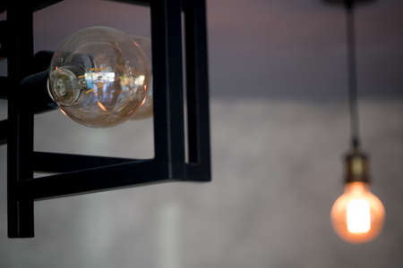 Select focus of vintage lamp decoration in coffee shop