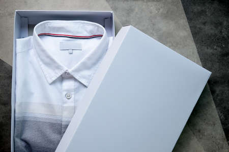 New men's shirt of white and gray colour in a gift boxの写真素材