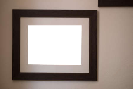 Empty frame on wall in gallery. Blank empty frames hanging