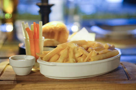 French fries the ultimate fast food snack appetizer on dinner table