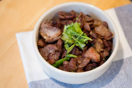Fried pork with garlic fried. Breakfast or lunch appetizer food in Thailand