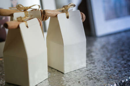 Honey in packets with wooden stick, cute souvenirs weddingの写真素材
