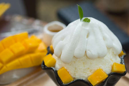 Korean style fresh mango shaved ice. Popular dessertの写真素材