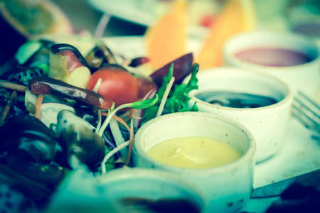 Close up of salad dressing in white bowlの写真素材