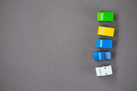 Colourfull toy wooden cars with empty space. Educational toys for children