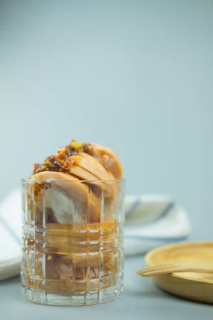 Delicious slice santol served with sweet and spicy sauce for snack or appetizer.