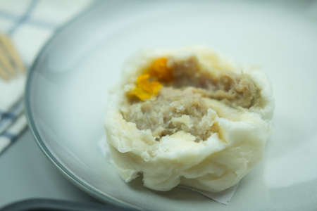 Show kind of Chinese steamed stuffed buns before eat, Focus on the dumpling bunの写真素材