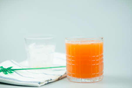 Summer lemonade peach and soda in glassの写真素材