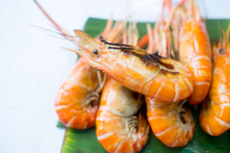 Close up of grilled shrimp on banana leafの写真素材