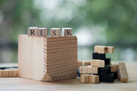 Wooden blocks with the word Risk. The concept of riskの写真素材