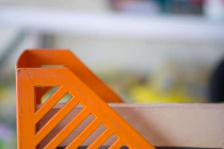Orange filing plastic box, close upの写真素材