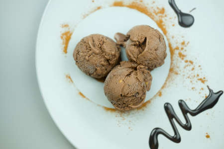 Scoops of three silky smooth chocolate ice cream, beautiful decoration
