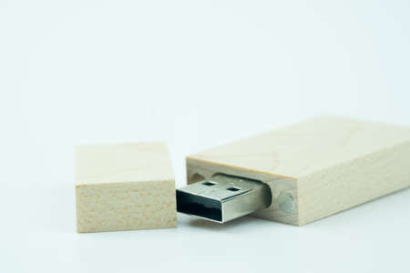 Wooden USB flash drive on white background. USB flash memory. Backup data of business concept.