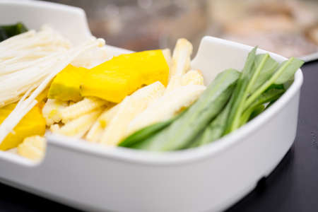 Close up of fresh vegetable set for sukiyaki or shabu shabuの写真素材