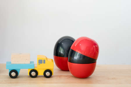 Black and red plastic egg or egg surprise toys. Concept of egg surpriseの写真素材