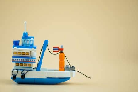 Miniature toy generic Thai fishing ship or tourist ship modified from fishing ship. Wooden native...