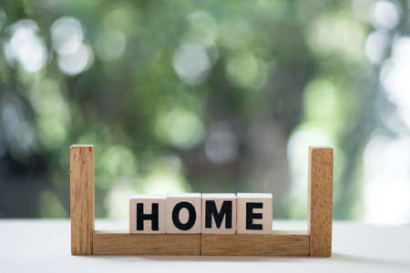 Wooden cubes with word home with copy space. Home word concept.