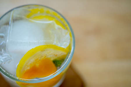 Mojito cocktail or soda drink with orange. From top view