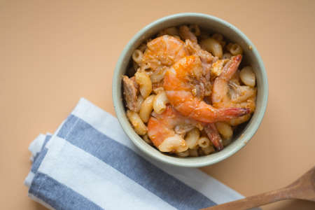 Fried Shrimp macaroni with tomato sauce in bowl, homemade food