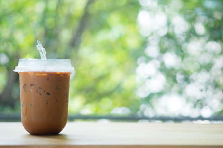 Fresh iced mocha coffee in plastic glass. Morning refreshing drink.の写真素材