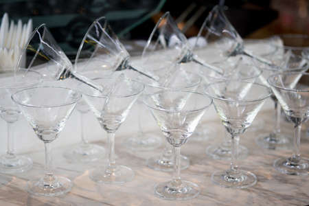 Many of glass for wine in row on table, side perspective view stock photo imageの写真素材