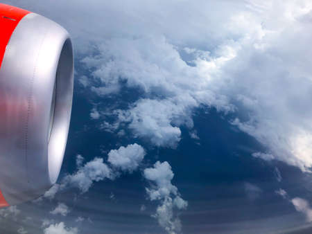 The view from the window of a passenger plane during the flight, turbine engine of the aircraft.
