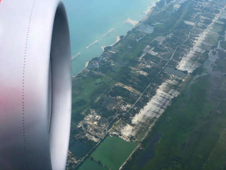 Jet airplane engine above city