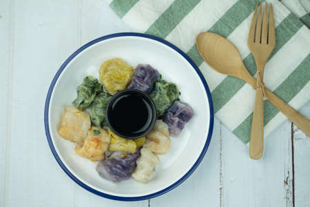 Steamed dumpling stuffed with garlic chives, taro and bamboo shoot in plateの写真素材