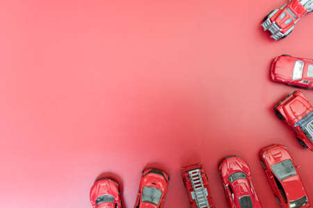 Kids various of car frame on red background. Top view and copy space for textの写真素材
