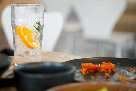 Dirty dishes and dirty glass on a table in a restaurant. After eating