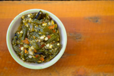 Close up of Northern Thai green chilli dip or Nam Prik Num in Thailand