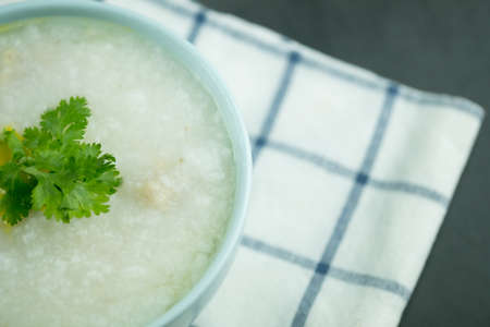 Congee with minced pork. Breakfast food concept.の写真素材