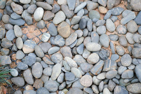 Abstract nature pebbles background. Blue pebbles texture. Various turquoise sea pebbles on the beach...