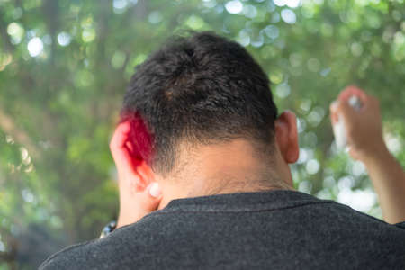 Young man are stressed and hand holding head with headache. Stress and frustration concept.の写真素材
