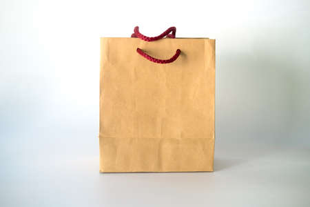 Shopping bag made from brown recycled paper. Add your own design or logo.の写真素材