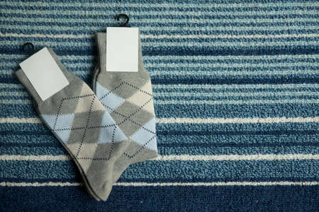 New two soft knitted sock. Concept of winter clothes