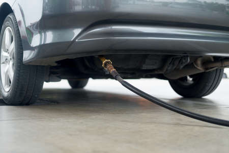 Auto refueling with energy LPG gas to car at Filling LPG station petroleum gas pump