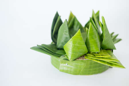 Krathong the handcrafted floating made of banana leaves and decoration with colorful flowers and...