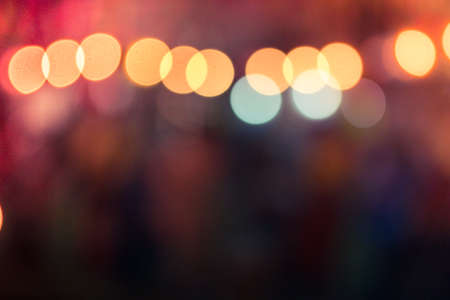 Abstract blurred bright yellow orange vintage lights bokeh background