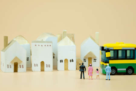 Miniature people : Children,students going to school with school bus. Image use for back to school, education concept.の写真素材