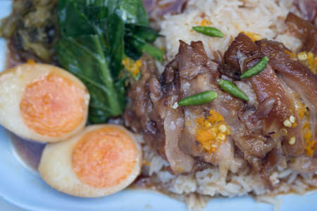 Stewed pork leg on rice with boiled egg, Traditional food in Thailand.の写真素材