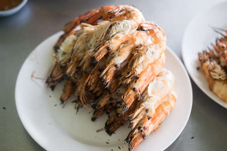 Burned shrimp or Grilled shrimp is very tasty eating with Thai sea food sauceの写真素材