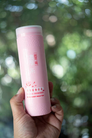 Bangkok, Thailand - December 10 2019: Souvenir from friend of milk tea (Rose honey milk tea flavor)...