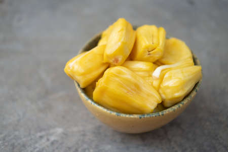 Fresh yellow ripe jackfruit slices sweet delicious. Exotic tropical fruitの写真素材
