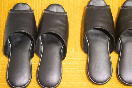 Close-up of slipper on the floor in bedroomの写真素材