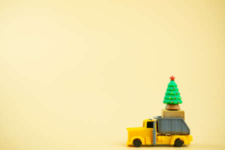 Pickup truck delivery of Christmas tree. Happy new year and merry christmasの写真素材