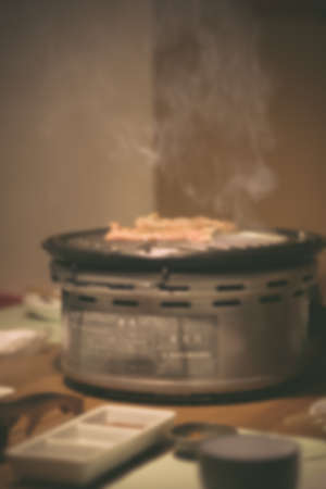 Blur background of raw beef on grill. Use for background food conceptの写真素材