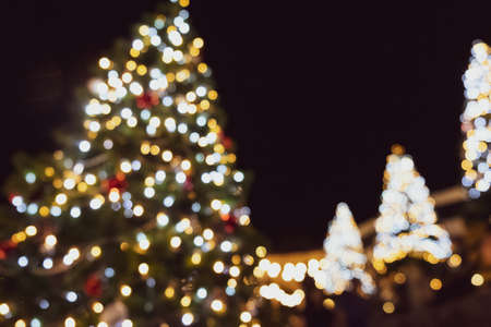 Abstract background of bokeh Christmas tree. Xmas decoration lightsの写真素材